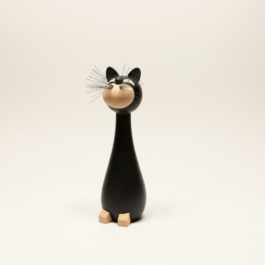 Gunnar Flørning black cat figurine, side view showing elongated form and metal whiskers