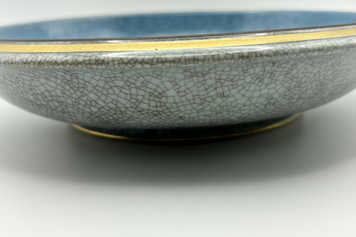 Close-up of crackle glaze pattern on ceramic dish exterior